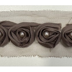 Tira de flores de 3 cm de diámetro con perla central