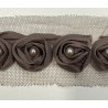 Tira de flores de 3 cm de diámetro con perla central