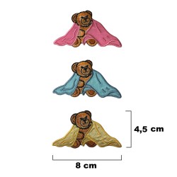 Aplicación termoadhesiva en forma de oso tapado con una manta